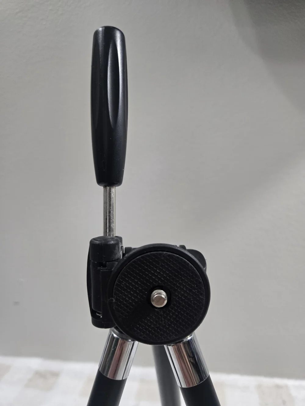 Compact Black Camera Tripod with Adjustable Head
